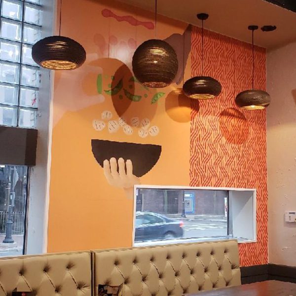 NGS graphics installed on a wall inside a Mongolian grill.