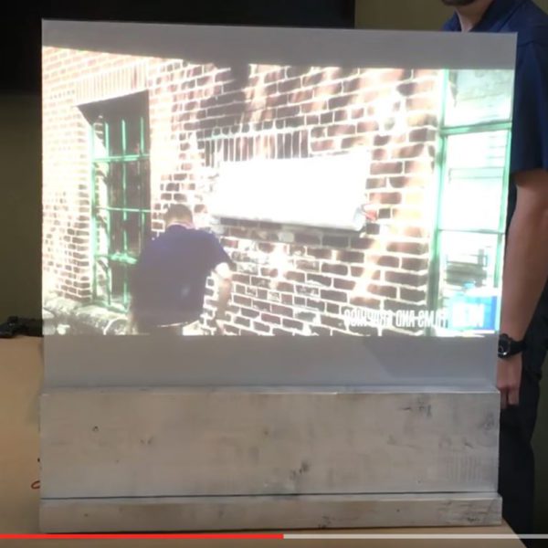 Switchable smart film demonstration with a live video playing.